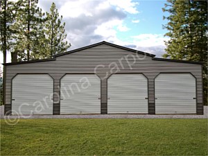 Vertical Roof Style Carolina Barn Fully Enclosed With Four Garage Doors